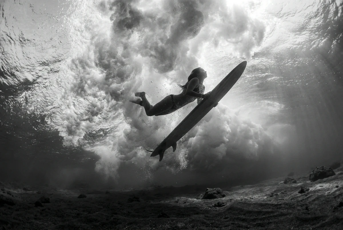 Black-and-white underwater duck-dive